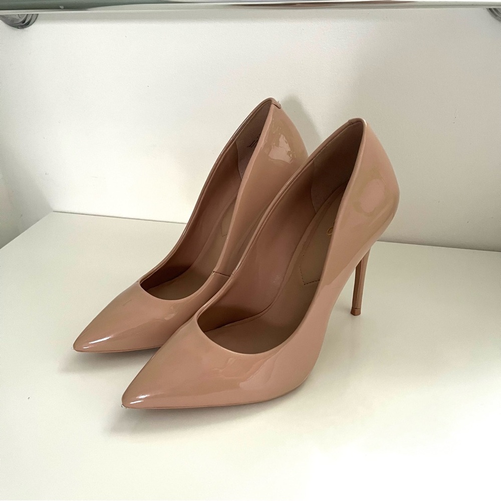 Aldo Stessy Patent Pumps